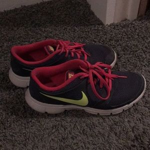 Purple Nike tennis shoes